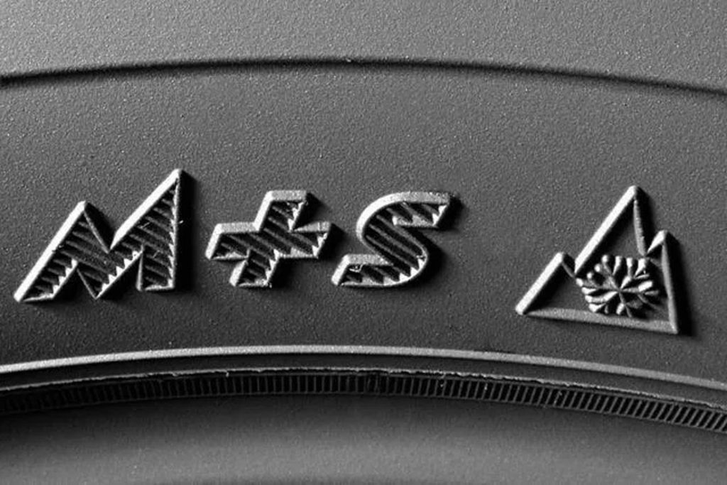 logo M+S e fiocco simboli su gomma invernale