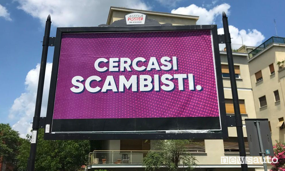 Cercasi Scambisti cartello pubblicitario