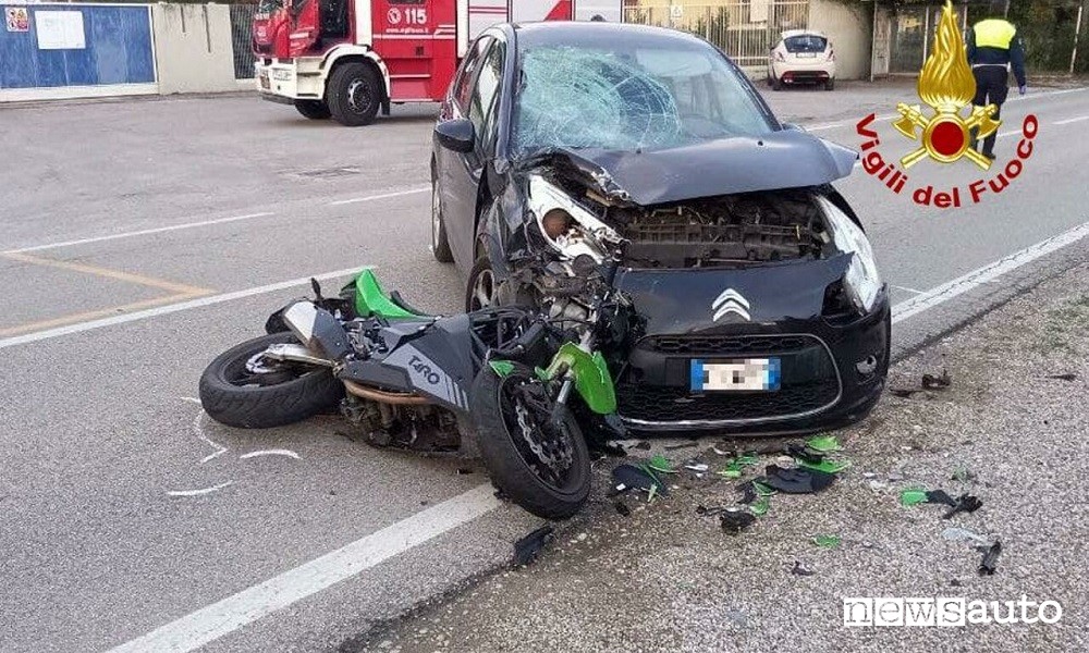 Clash between motorcycle and car