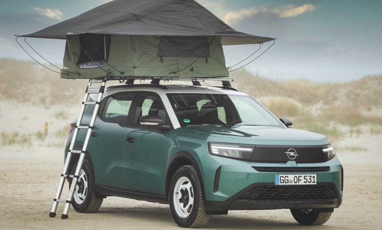 Opel Frontera con tenda da tetto Thule Foothill
